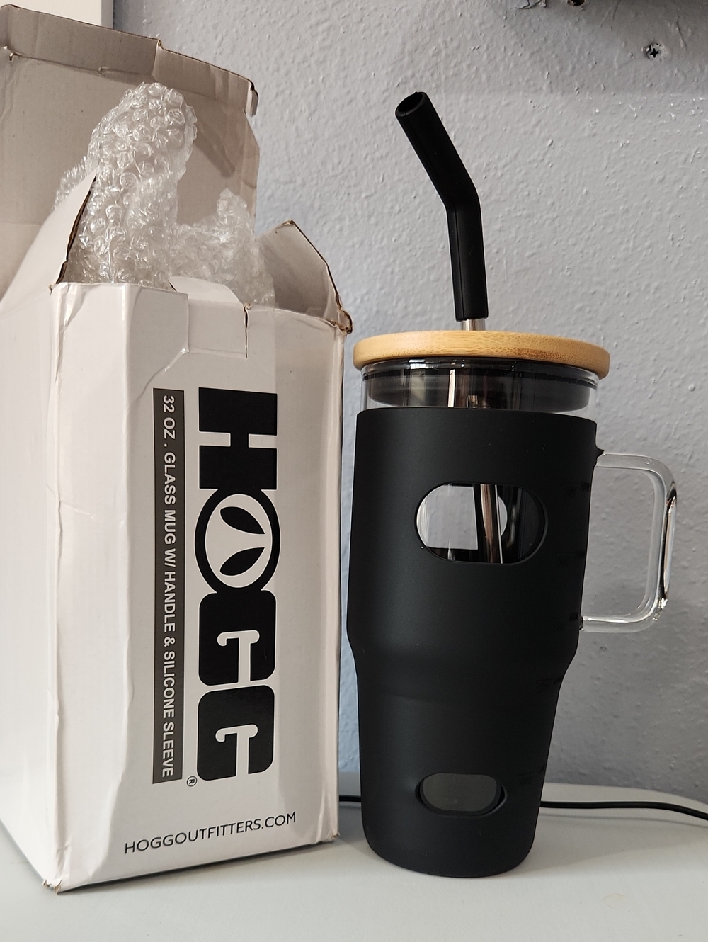 HOGG Black Glass Travel Mug with Handle and Bamboo Lid.